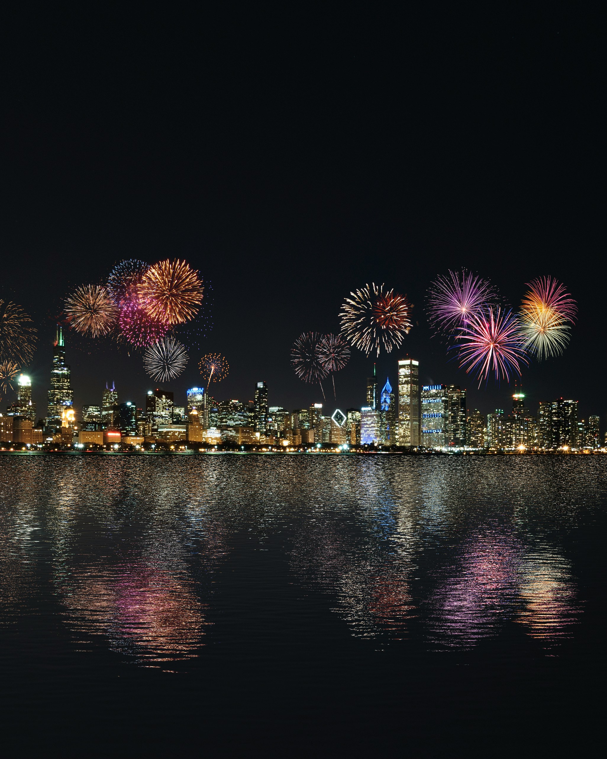 Fireworks over a city skyline